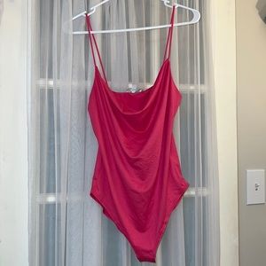 Pink body suit size MEDIUM